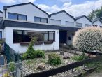 Viersen: renovierungsbedürftiges Reihenmittelhaus + Garten + Garage naturnah an den Niersauen - Ansicht Front